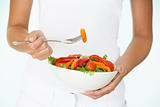 Young Woman Holding Bowl Of Salad
