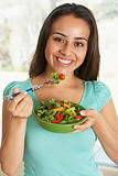 Teenage Girl Eating A Salad
