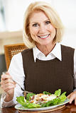 Senior Woman Eating Salad