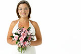Portrait Of Bride Holding Bouquet Of Flowers