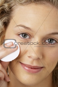 Young Woman Removing Make-Up