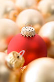Selection of red and gold christmas tree baubles