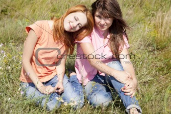 Two girlfriends at countryside.