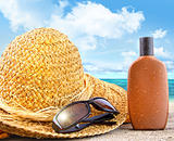 Beach items and suntan lotion at the beach