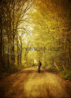 Man walking  on a lonely country road