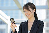 business woman using mobile cell phone