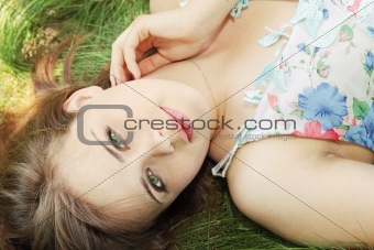  girl lies on grass