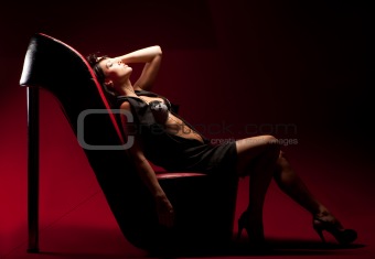 woman sitting on a chair