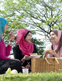 muslim girl picnic with friend at park