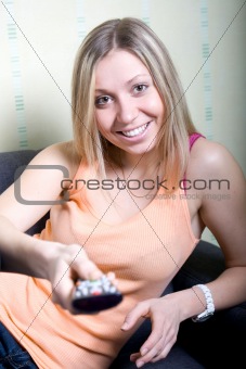 Girl holding a remote