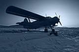 The dark blue plane on snow