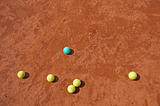 Business metaphor with tennis balls 