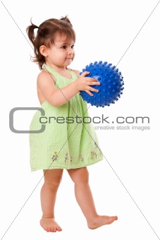 Happy toddler girl with ball