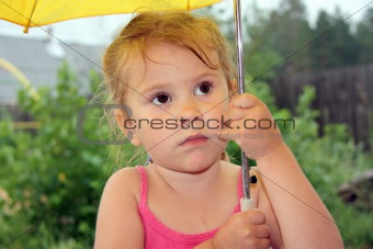 sad girl under an umbrella
