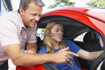 Teenage Girl Learning How To Drive