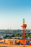 Construction sight with crane and buildings
