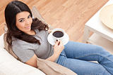 Beautiful Hispanic Latina Woman Drinking Tea or Coffee