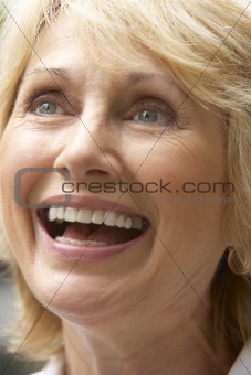 Portrait Of Senior Woman Smiling Happily