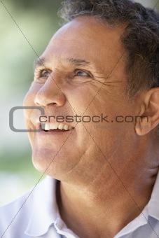 Portrait Of Senior Man Smiling Happily