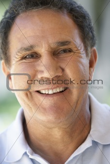 Portrait Of Senior Man Smiling At The Camera