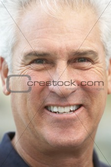 Senior Man Smiling At The Camera