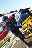 Paramedics unloading patient from Medevac