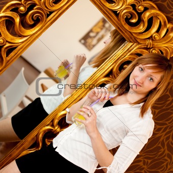 Beautiful girl infront of a mirror
