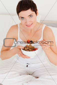 Lovely woman eating breakfast