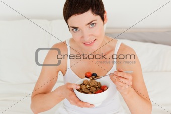 Lovely woman having breakfast