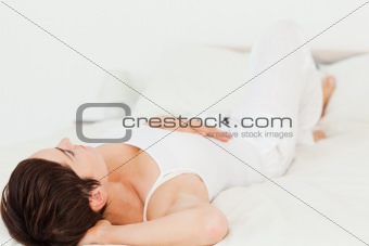 Woman lying on her back