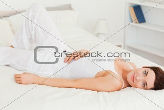 Lovely woman lying on her back