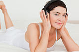Young brunette listening to music