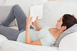 Short-haired brunette reading a book