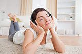 Serene woman listening to music