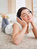 Portrait of a serene woman listening to music