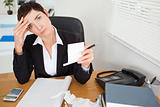 Female accountant checking receipts