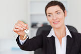 Woman showing keys