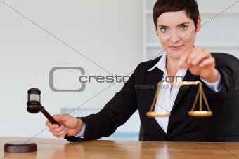 Judge with a gavel and the justice scale