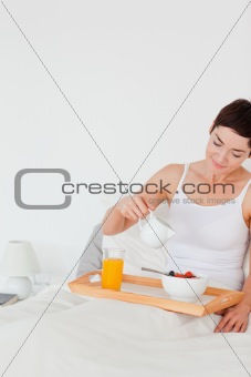 Portrait of a woman having breakfast
