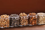 collection of jars with different seeds