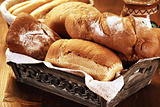 different breads in an antique basket