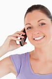 Portrait of a beautiful female on the phone while standing