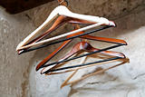 series of emply coat hangers
