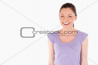 Joyful female posing while standing