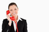 Good looking female in suit on the phone