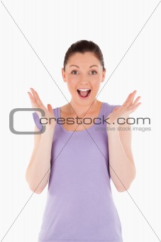 Enthusiastic female posing while standing