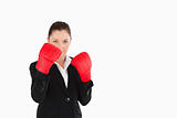 Attractive woman wearing some boxing gloves