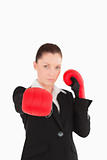 Cute woman wearing some boxing gloves