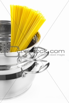 Italian cooking / saucepan with spaghetti / isolated on white