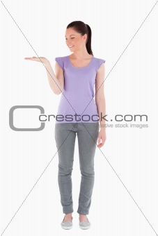 Good looking woman showing a copy space